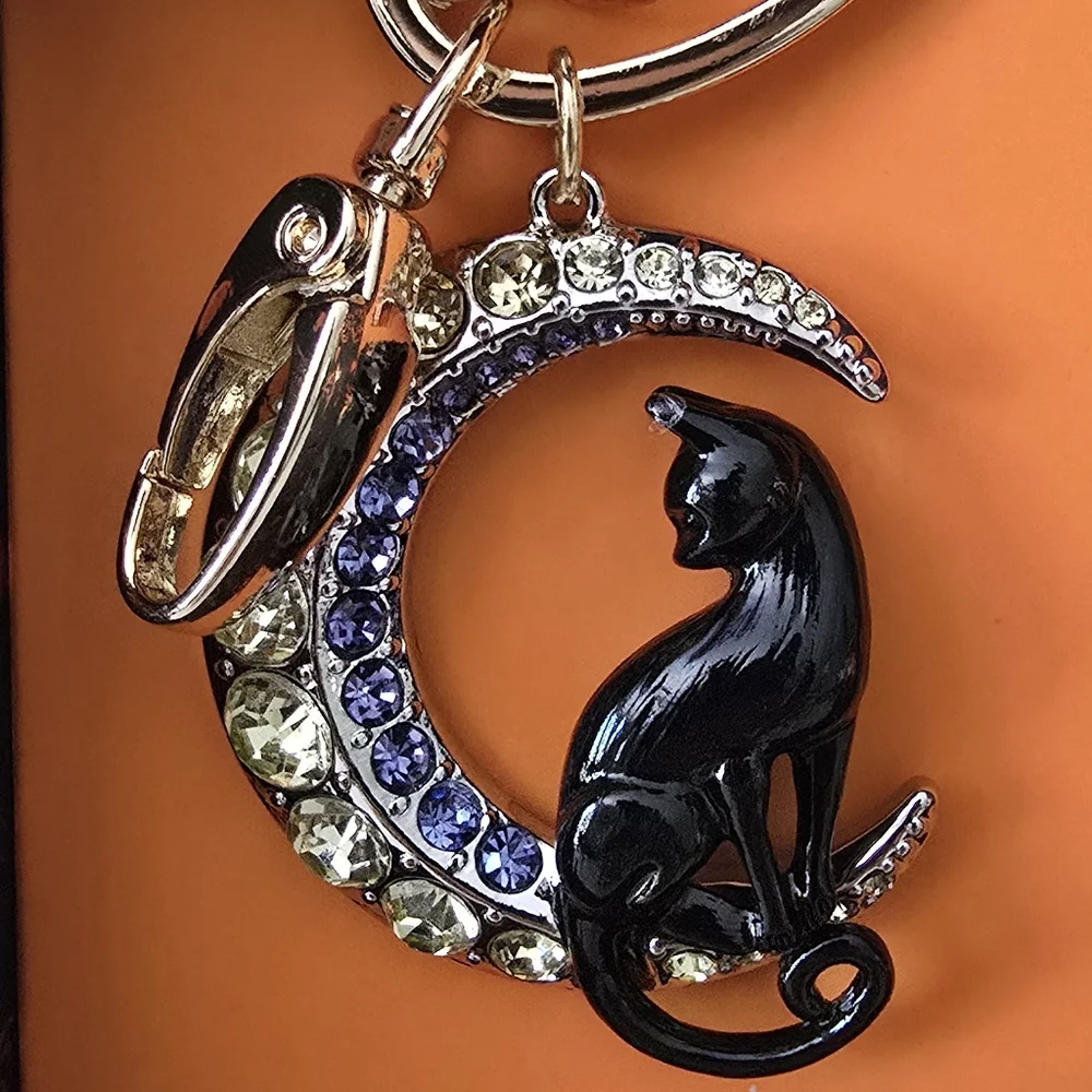 Betsey Johnson Black and Gold Cat Crescent Charm